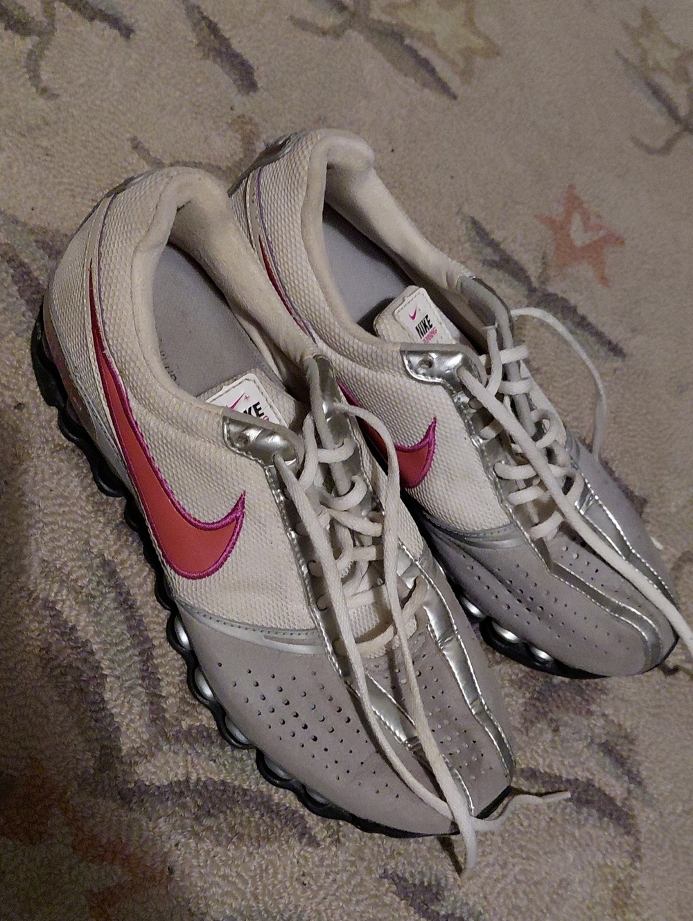 Nike Women’s White and Pink Athletic Trainers